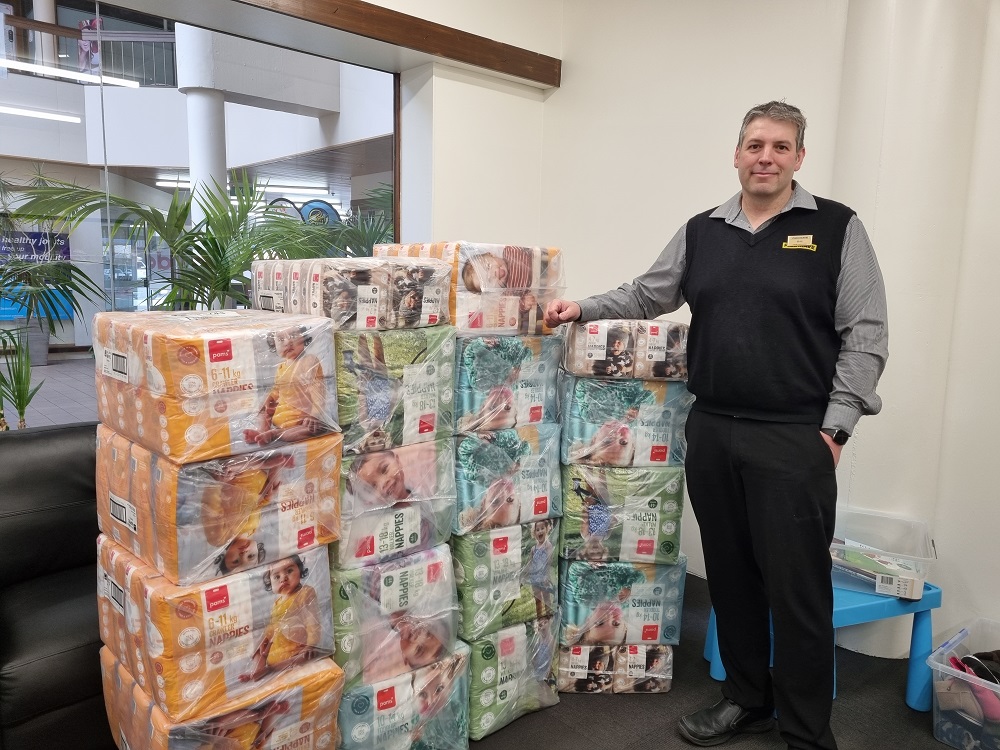 PAK'nSAVE Dunedin Store Manager Phil with Pams Nappies donation